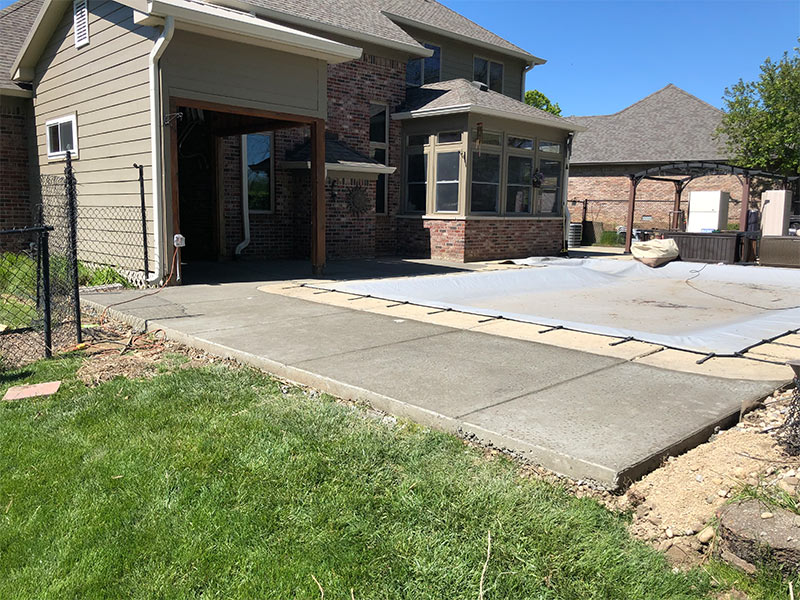 concrete wrapped around a pool